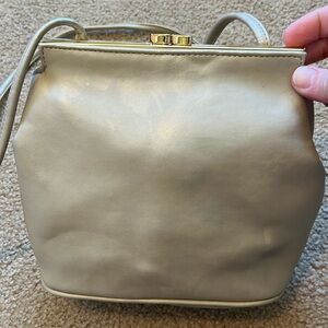 Giani Bernini beige leather bag with gold clasp closure and inner zipper pocket